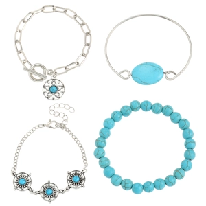 Retro Bohemian turquoise bracelet set featuring silver-tone chains and turquoise bead bangles