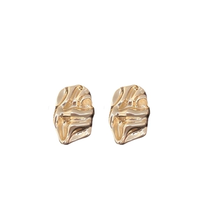 Irregular golden metal stud earrings with elegant liquid-style texture and crinkled design