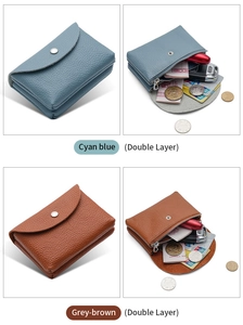 Detailed view of cyan blue and grey-brown double-layer leather coin pouches in pebble grain