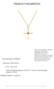 Close-up of 18K gold plated S925 silver cross necklace with pink gemstone center