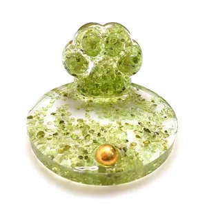 Creative resin cat paw desktop ornament with green crystal stone fragments and gold bead
