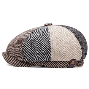 Classic newsboy cap with retro houndstooth pattern in brown and beige tones