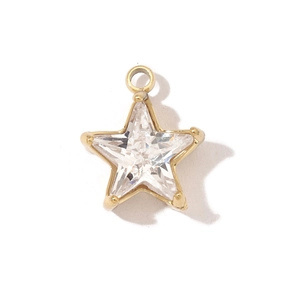 Macro shot of gold-plated star pendant with clear faceted zircon inlay on white background