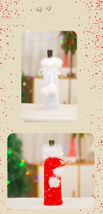 Detail of Christmas wine bottle cover with sequins and white faux fur trim decor