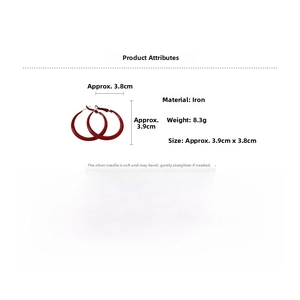 Detail view of red hoop earrings with dimensions 3.9cm and 8.3g weight specs
