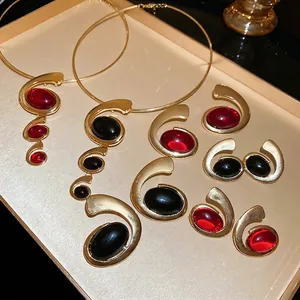 Luxury oval resin necklace and earrings set in gold vintage metal scroll design