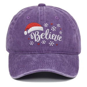 Close-up of snowflake and Believe embroidery on purple washed cotton baseball cap