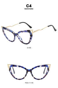 Detail view of cat eye TR90 glasses frames with marble texture and golden temples