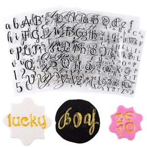 Detailed view of clear silicone letter and number stamps for fondant or clay decoration