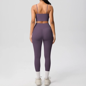Detailed back view of purple yoga set featuring a strapless crop top and high-waist leggings