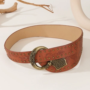 Punk style reddish brown leather belt with floral embossing and metal rivet decorations