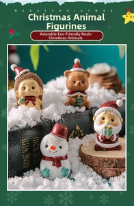 Detailed view of Christmas resin miniatures with hedgehog, bear, snowman, and Santa figurines