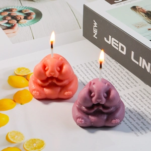 Cute marmot shaped DIY candle molds for aromatherapy in coral red and lilac purple