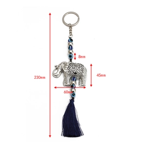 Detail of silver elephant keychain with blue evil eye beads and tassel measurements
