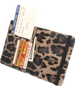 Interior view of leopard print RFID passport holder showing card slots and elastic strap