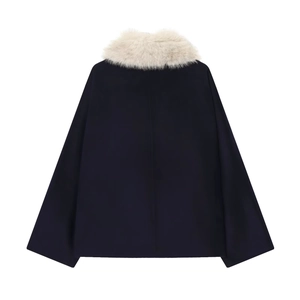 Dark blue cape jacket with white faux fur collar shown in back view on white background