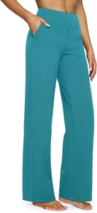 Dettaglio dei pantaloni da yoga a vita alta con tasche laterali e gamba larga in teal