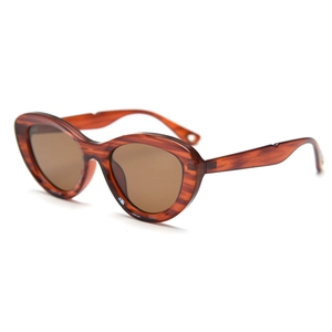 Trendy cat eye polarized sunglasses with thick red-brown tortoiseshell frames and brown lenses