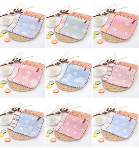 Close-up of 6-layer cotton baby gauze towels with various cute cartoon patterns and edges