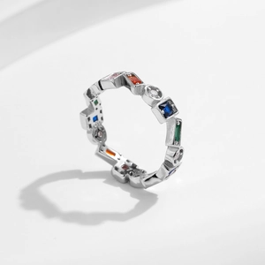 S925 sterling silver geometric ring with colorful zircon stones on a white background