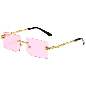 Frameless square sunglasses featuring golden snake-shaped metal temples and pink lenses