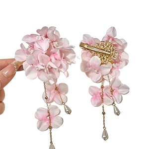 Elegant pink fabric flower hair clip with pearls and long tassel fringe for women