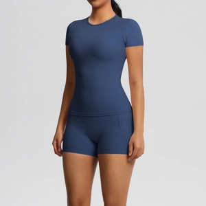 Detail of navy blue slim-fit yoga set showing double-sided brushed fabric and stitching