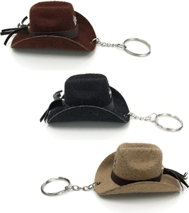 Three western felt cowboy hat keychains in brown and black with silver star charms