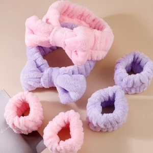 Soft coral fleece headband and wristband set with bow design in pink and purple colors