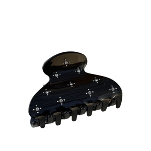 Elegant black acetate hair claw clip with sparkling rhinestones for stylish hair styling
