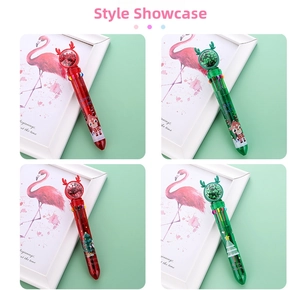 Close-up of Christmas 10-color ballpoint pens with reindeer sequins and festive patterns