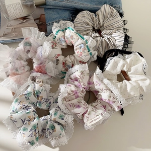 Set of six floral lace scrunchies in pastel colors with sweet cottagecore aesthetic