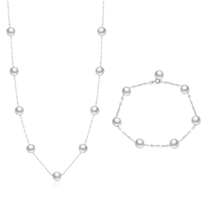 Elegant S925 silver necklace and bracelet set featuring multiple glossy white pearls