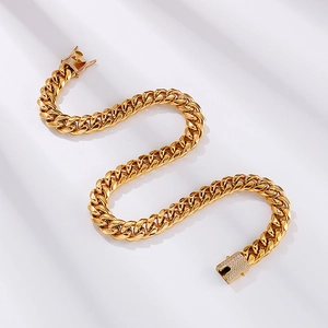 S-shaped golden titanium steel Cuban link necklace with iced out diamond box clasp detail
