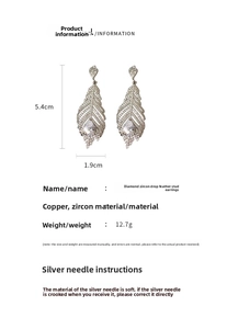 Détails et dimensions des boucles d'oreilles plume en argent avec zircon goutte d'eau
