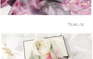 Detailed macro shot of floral print on lightweight translucent silk scarf fabric