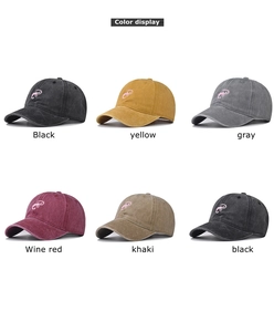 Multiple colors of washed cotton baseball caps with embroidered scorpion logo