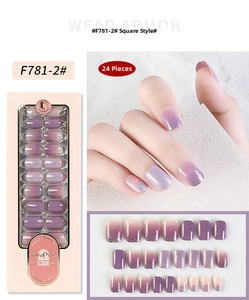 Detail view of square purple-pink gradient press-on nails with fine glitter finish