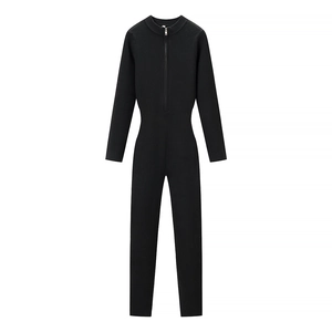Women's black half-zip knit jumpsuit with long sleeves and ribbed texture on white background