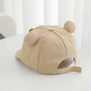 Detail view of khaki toddler panda hat featuring 3D ears and adjustable back strap closure