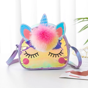 Close-up of laser TPU unicorn crossbody bag with large pom-pom and adjustable strap