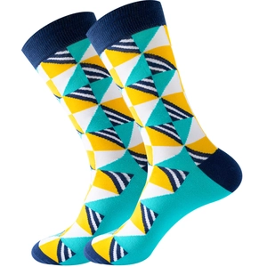 Detailed view of geometric patterned cotton crew socks with striped yellow and blue design