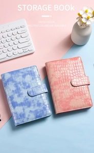 Detail showing macaron color A6 PU leather notebooks with crocodile texture and magnetic clasp