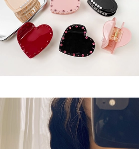 Detailed view of acetic acid heart claw clips with rhinestones and pearls in various colors