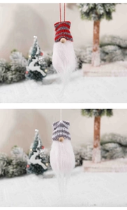 Detail of red and grey striped knitted Christmas gnomes with wooden nose and faux fur beard
