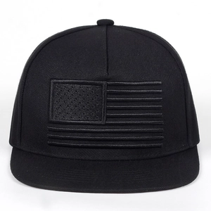 Black flat brim baseball cap featuring a black embroidered American flag pattern