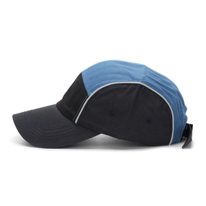 Side view of two-tone navy and light blue baseball cap with reflective piping details
