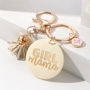 Handmade khaki wood pendant keychain with GIRL MAMA engraving and beige tassel detail