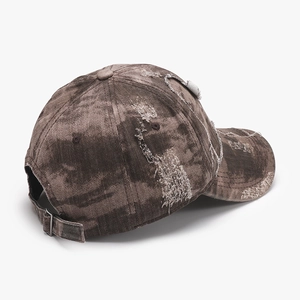 Distressed camo baseball cap with vintage washed finish and adjustable strap