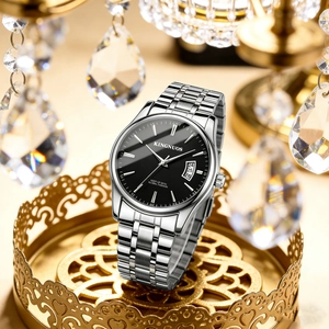Close-up of KINGNUOS stainless steel watch with black dial and date display on gold stand